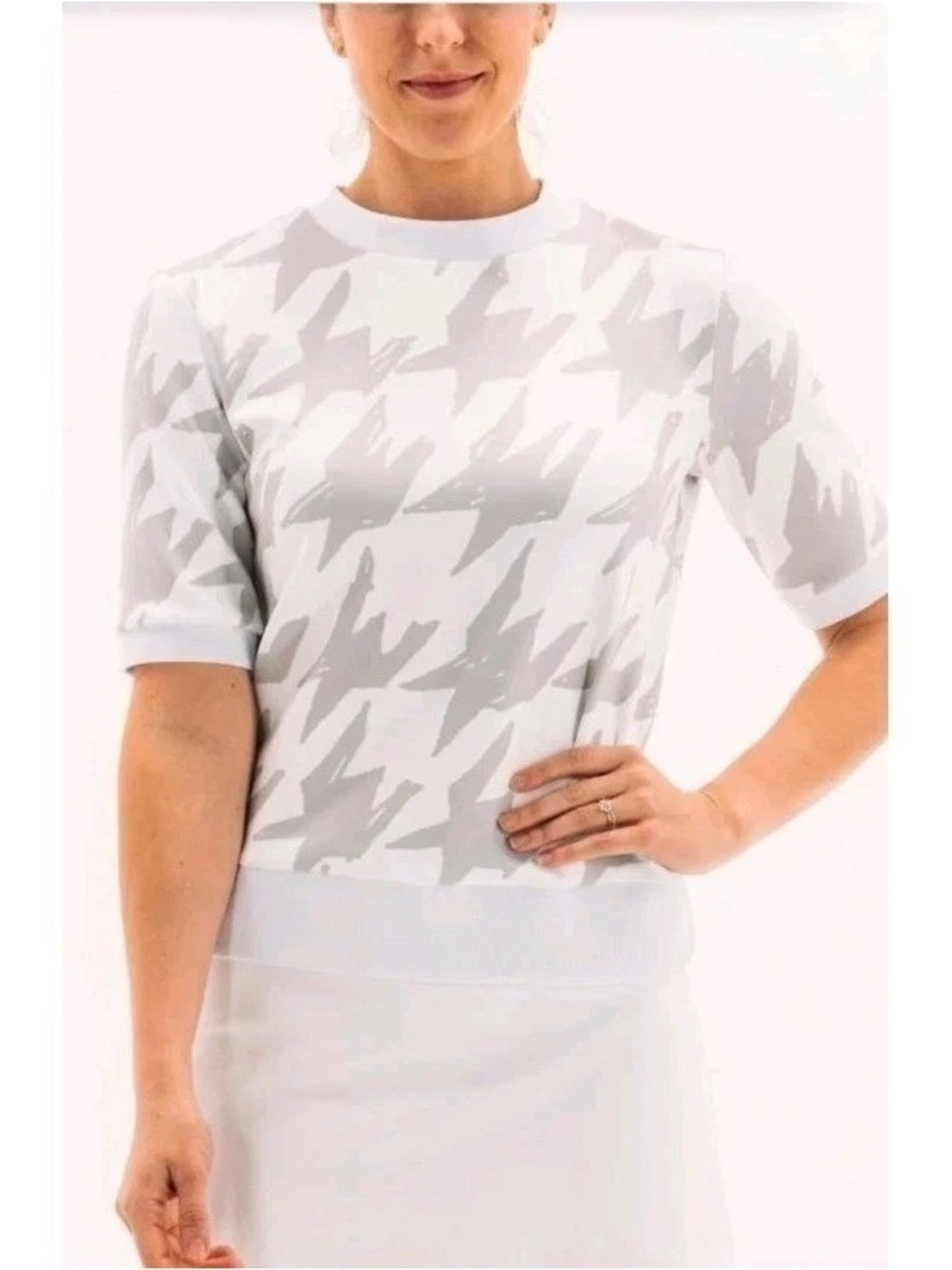 Women’s short sleeve golf shirt by Foray Golf.